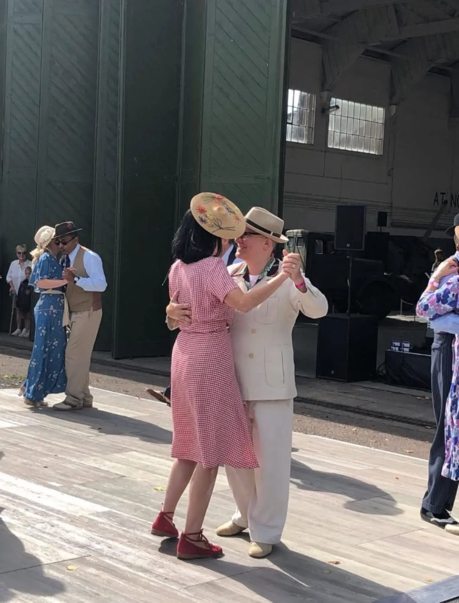 Jay and Natasha dancing Balboa in close embrace at Duxford Airshow