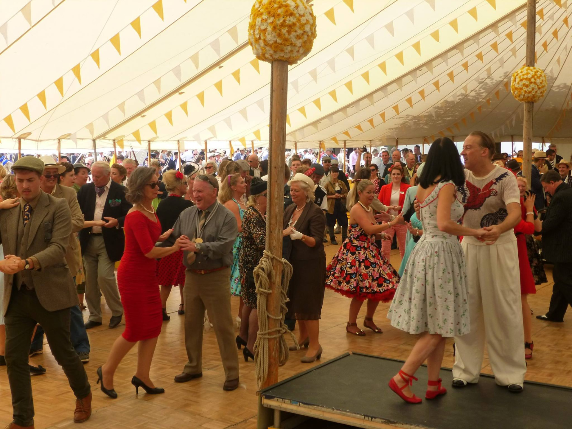 Paul and Natasha teaching a busy swing dance class at Goodwood Revival